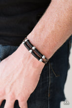 Load image into Gallery viewer, Black cording wraps around two skinny leather bands, securing classic silver beads in place for a ruggedly layered look. Features an adjustable sliding knot closure.  Sold as one individual bracelet.  Always nickel and lead free.