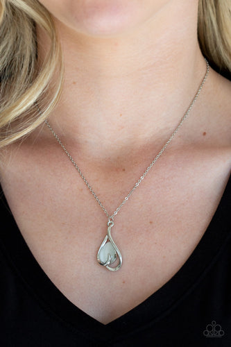 Shimmery silver bars curl around a white teardrop moonstone, creating an elegant heart shaped pendant below the collar. Features an adjustable clasp closure.  Sold as one individual necklace. Includes one pair of matching earrings.  Always nickel and lead free.