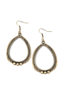 Decorated in metallic rope-like textures, a studded brass teardrop is stamped and etched in tribal inspired patterns for a rustic flair. Earring attaches to a standard fishhook fitting. Sold as one pair of earrings.