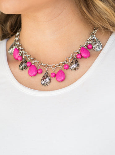 A collection of round and teardrop pink beads and decorative silver teardrops swing from the bottom of double-link silver chain, creating a vivacious fringe below the collar. Features an adjustable clasp closure.  Sold as one individual necklace. Includes one pair of matching earrings.   