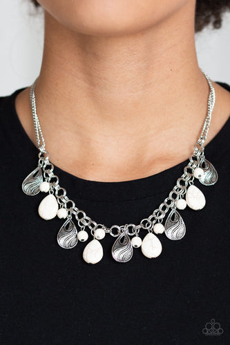 A collection of round and teardrop white stone beads and decorative silver teardrops swing from the bottom of double-link silver chain, creating an earthy fringe below the collar. Features an adjustable clasp closure.  Sold as one individual necklace. Includes one pair of matching earrings.  Always nickel and lead free.