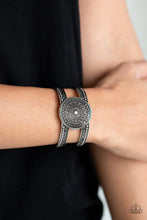 Load image into Gallery viewer,  Radiating with antiqued sunburst textures, a round silver frame is pressed into the center of a silver cuff studded and embossed in tribal inspired patterns for a bold indigenous look.  Sold as one individual bracelet.  Always nickel and lead free. 
