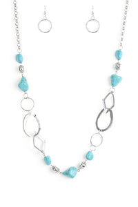 Bits of refreshing turquoise stones and ornate silver beading give way to asymmetrical silver frames. The mismatched frames drape across the chest, creating an earthy collision of rock and metal. Features an adjustable clasp closure.  Sold as one individual necklace. Includes one pair of matching earrings.