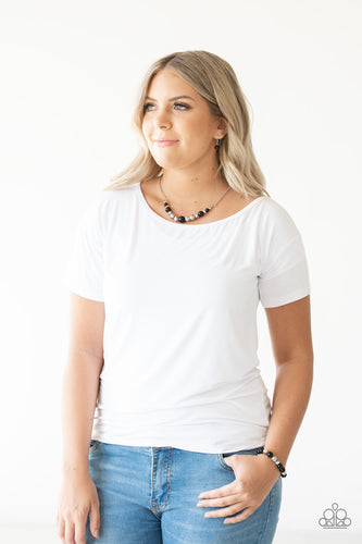 Necklace and Earrings:  A collection of polished black, classic silver, and crystal-like hematite beads are threaded along an invisible wire below the collar for a glamorous look. Features an adjustable clasp closure.  Bracelet:  A collection of polished black, classic silver, and crystal-like hematite beads are threaded along a stretchy band, creating a refined look around the wrist.