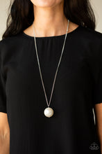 Load image into Gallery viewer, An oversized white pearl pendant swings from the bottom of a lengthened silver chain for a dramatic look. Features an adjustable clasp closure.  Sold as one individual necklace. Includes one pair of matching earrings.  Always nickel and lead free.