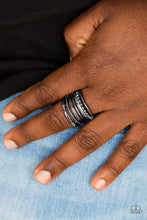 Load image into Gallery viewer, Featuring smooth, dotted, and textured finishes, mismatched gunmetal bands layer across the finger for a bold industrial look. Features a stretchy band for a flexible fit.  Sold as one individual ring.  Always nickel and lead free.