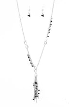 Load image into Gallery viewer, Tinted in a neutral finish, asymmetrical black seed beads and dainty silver cube beads trickle along a shimmery silver chain. A glistening silver infinity charm gives way to a shimmery tassel featuring matching beads for a whimsical finish. Features an adjustable clasp closure.  Sold as one individual necklace. Includes one pair of matching earrings.