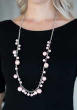 Load image into Gallery viewer, Varying in size, bubbly pink pearls trickle along a shimmery silver chain for a refined look. Features an adjustable clasp closure.  Sold as one individual necklace. Includes one pair of matching earrings. 