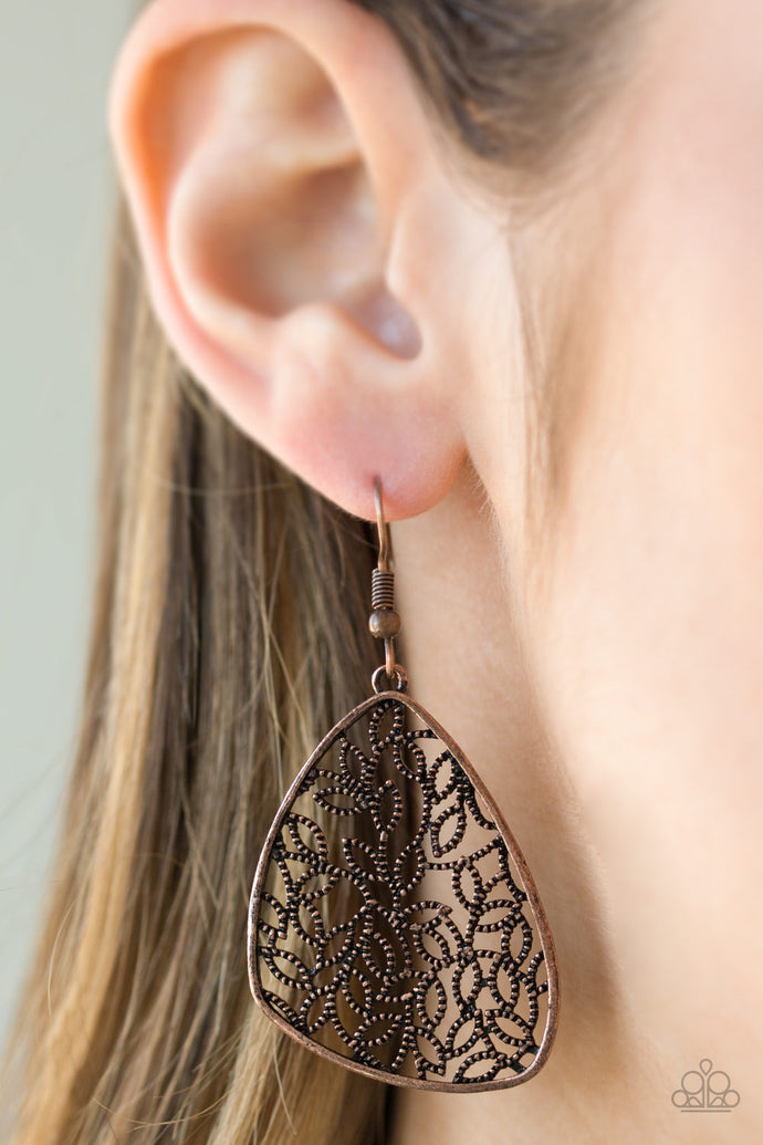   Dotted in texture, leafy copper filigree climbs an asymmetrical copper frame, creating a seasonal lure. Earring attaches to a standard fishhook fitting.  Sold as one pair of earrings.  Always nickel and lead free.