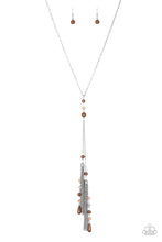 Load image into Gallery viewer, Dainty brown pearls and sparkling brown crystal-like beads give way to two shimmery silver chain tassels. Infused with ornate silver beads, strands of matching beads trickle down the tassels for a refined flair. Features an adjustable clasp closure.  Sold as one individual necklace. Includes one pair of matching earrings.  Always nickel and lead free.