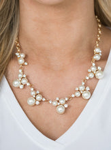 Load image into Gallery viewer, Clusters of pearls and dazzling white rhinestones join below the collar, creating refined frames. Infused with a glistening gold chain, the sections of luminescent frames trickle along the neck in a timeless fashion. Features an adjustable clasp closure.  Sold as one individual necklace. Includes one pair of matching earrings.  Life of the Party Exclusive  