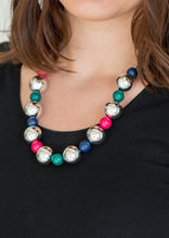 Load image into Gallery viewer, Polished multicolored beads and dramatic silver beads drape below the collar for a perfect pop of color. Features an adjustable clasp closure.  Sold as one individual necklace. Includes one pair of matching earrings.