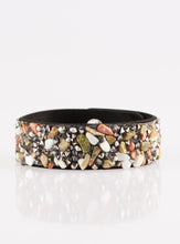 Load image into Gallery viewer, Bits of crushed natural stone is encrusted along the front of a black suede band. Smoky and hematite rhinestones are sprinkled along the band, adding edgy shimmer to the sassy seasonal palette. Features an adjustable snap closure. Sold as one individual bracelet.