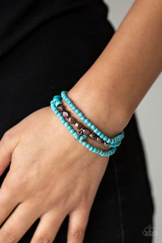 A collection of refreshing turquoise stone beads and faceted copper beads are threaded along stretchy bands around the wrist, creating earthy layers.  Sold as one set of three bracelets.  Always nickel and lead free.