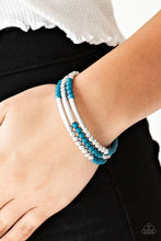 Load image into Gallery viewer, A collection of refreshing blue and shiny silver accents are threaded along a long wire to create an infinity wrap bracelet. Coil design allows for an adjustable fit.  Sold as one individual bracelet.  Always nickel and lead free.