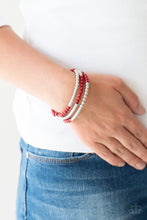 Load image into Gallery viewer, A collection of robust red beads and shiny silver accents are threaded along a long wire to create an infinity wrap bracelet. Coil design allows for an adjustable fit.  Sold as one individual bracelet.  Always nickel and lead free.
