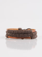 Load image into Gallery viewer, Shiny brown cords knot around three brown leather strands, securing the bands in place across the wrist for a rugged look. Features an adjustable sliding knot closure.  Sold as one individual bracelet.