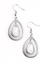 Load image into Gallery viewer, Etched in serrated shimmer, two silver teardrops drip from the ear in a refined fashion. A pearly white bead swings from the center of the airy lure, adding a colorful finish to the elegant palette. Earring attaches to a standard fishhook fitting.  Sold as one pair of earrings.  