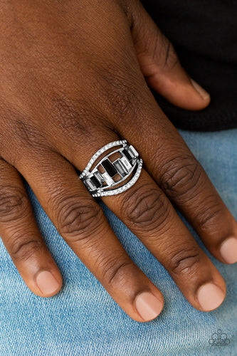 White rhinestone encrusted bands flank a row of emerald cut glass beads in shades of black, gray, and white for a regal look. Features a stretchy band for a flexible fit.  Sold as one individual ring.  Always nickel and lead free.