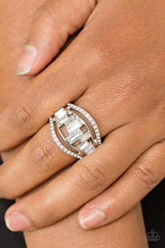 White rhinestone encrusted bands flank a row of emerald cut glass beads in shades of white for a regal look. Features a stretchy band for a flexible fit.  Sold as one individual ring.  Always nickel and lead free.