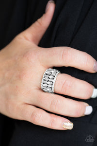 Featuring regal marquise style cuts, glittery white rhinestones are encrusted down the center of a silver band radiating with glassy white rhinestones for an edgy look. Features a stretchy band for a flexible fit.  Sold as one individual ring.  Exclusive Summer 2019 Party Pack Item   Always nickel and lead free.