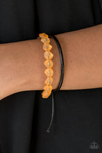 Load image into Gallery viewer, Featuring an opaque finish, a strand of faceted orange beads and a strand of shiny leather cording wrap around the wrist, creating dainty layers. Features an adjustable sliding knot closure.  Sold as one individual bracelet.  Always nickel and lead free.