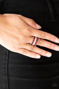 Featuring refined marquise cuts, glittery red rhinestones flare from a center of glassy white rhinestones, creating a regal band across the finger. Features a stretchy band for a flexible fit.  Sold as one individual ring.  Always nickel and lead free.