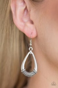 The center of a glistening silver teardrop is embossed in a metallic rope-like pattern for an artisan inspired look. Earring attaches to a standard fishhook fitting.  Sold as one pair of earrings.  Always nickel and lead free.