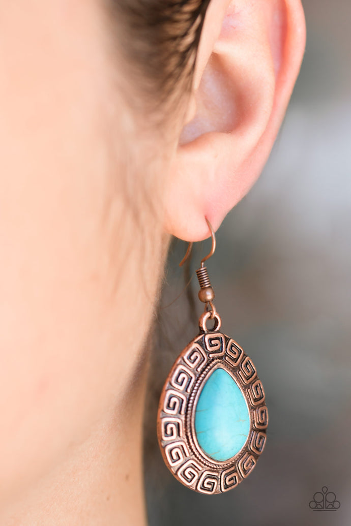 Chiseled into a tranquil teardrop, a refreshing turquoise stone is pressed into the center of a copper frame embossed in spiraling patterns for a tribal look. Earring attaches to a standard fishhook fitting.  Sold as one pair of earrings.  Always nickel and lead free.
