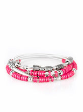 Load image into Gallery viewer, Mismatched silver accents and disc shaped pink beading slides along stretchy spring-like wires for a spunky tribal look.  Sold as one set of four bracelets.