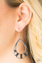 Load image into Gallery viewer, Sections of black rhinestone encrusted frames adorn the bottom of an ornate silver teardrop, creating a refined lure. Earring attaches to a standard fishhook fitting.  Sold as one pair of earrings.