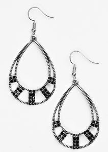 Sections of black rhinestone encrusted frames adorn the bottom of an ornate silver teardrop, creating a refined lure. Earring attaches to a standard fishhook fitting.  Sold as one pair of earrings.