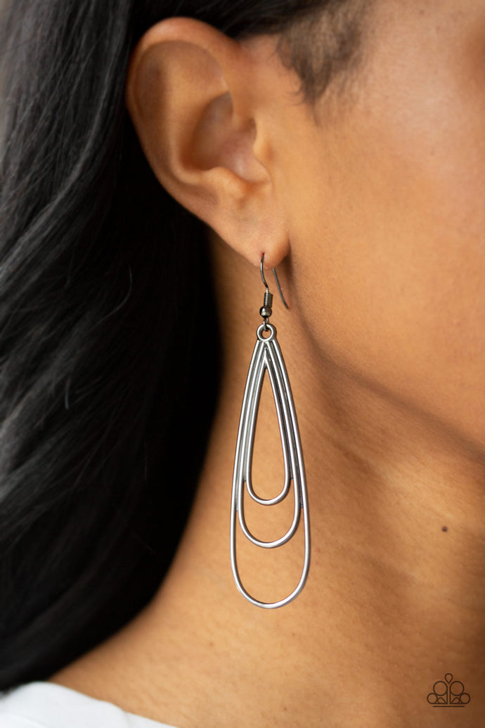 Gradually increasing in size, glistening gunmetal teardrops coalesce into a rippling frame for an edgy look. Earring attaches to a standard fishhook fitting.  Sold as one pair of earrings. Always nickel and lead free.