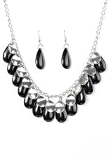 Load image into Gallery viewer, Polished black teardrops drip from the bottom of a shimmery silver chain, creating a colorful fringe below the collar. Featuring a delicately hammered surface, dainty silver teardrops are sprinkled along the chain for a splash of eye-catching shimmer. Features an adjustable clasp closure. Sold as one individual necklace. Includes one pair of matching earrings.