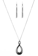 Load image into Gallery viewer, Swinging from the bottom of a dainty gunmetal chain, a glistening ribbon of gunmetal twists into an elegant pendant for a refined look. Features an adjustable clasp closure.  Sold as one individual necklace. Includes one pair of matching earrings.