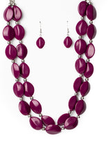 Load image into Gallery viewer, Two rows of dainty silver beads and faceted Magenta Purple faux stone beads alternate along invisible wires below the collar, creating bold, colorful layers. Features an adjustable clasp closure.  Sold as one individual necklace. Includes one pair of matching earrings.