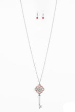 Load image into Gallery viewer, Encrusted in dazzling pink rhinestones, a shimmery silver key pendant swings from the bottom of a lengthened silver chain for a vintage inspired look. Features an adjustable clasp closure.  Sold as one individual necklace. Includes one pair of matching earrings.