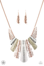 Load image into Gallery viewer, Copper, silver and brass plates featuring various hammered and filigreed textures fan out across the chest along a thick copper snake chain. The gorgeous tribal design falls gracefully below the collar into a dramatic statement piece. Features an adjustable clasp closure.  Sold as one individual necklace. Includes one pair of matching earrings.