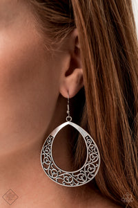 Vine-like filigree swirls along the bottom of a thick silver teardrop frame, creating a whimsical display. Earring attaches to a standard fishhook fitting.  Sold as one pair of earrings..   Always nickel and lead free.