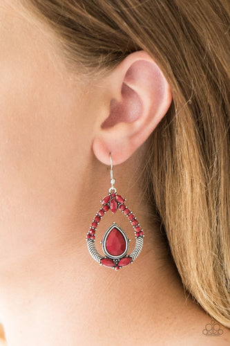 Varying in cut, faceted red beads are encrusted along an ornate silver teardrop frame for a whimsical look. Earring attaches to a standard fishhook fitting.  Sold as one pair of earrings.  Always nickel and lead free.