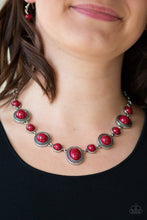 Load image into Gallery viewer, Featuring smooth and studded silver frames, rich red beads link below the collar in a seasonal fashion. Features an adjustable clasp closure.  Sold as one individual necklace. Includes one pair of matching earrings.  Always nickel and lead free.