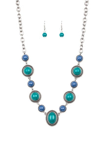 Featuring smooth and studded silver frames, refreshing blue and green beads link below the collar in a seasonal fashion. Features an adjustable clasp closure.  Sold as one individual necklace. Includes one pair of matching earrings.
