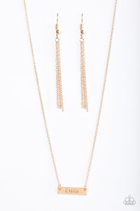 Stamped in the inspired word “faith,” a dainty gold plate hangs from a shimmery gold chain just below the collar for a causal look. Features an adjustable clasp closure.  Sold as one individual necklace. Includes one pair of matching earrings.