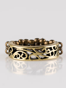 Brushed in an antiqued shimmer, vine-like filigree dances across the finger for a seasonal fashion. Features a dainty stretchy band for a flexible fit.  Sold as one individual ring.
