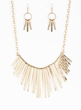 Load image into Gallery viewer, Embossed in edgy linear patterns, flat gold rods alternate with plain gold rods below the collar, creating a fiercely tapered fringe. Features an adjustable clasp closure.  Sold as one individual necklace. Includes one pair of matching earrings.