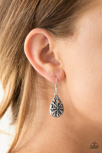 Brushed in an antiqued finish, shimmery silver filigree joins into a dainty teardrop frame for a whimsical look. Earring attaches to a standard fishhook fitting.  Sold as one pair of earrings.  Always nickel and lead free.