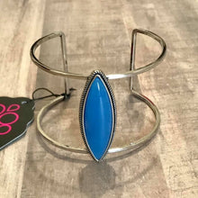 Load image into Gallery viewer, Featuring a blue marquise-style stone center that sits atop an airy silver cuff for a seasonal look.  Sold as one individual bracelet.
