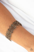 Load image into Gallery viewer, Radiating with studded detail, ornate copper filigree frames are threaded along stretchy bands around the wrist for a whimsical look.  Sold as one individual bracelet.  Always nickel and lead free.