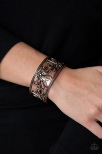 A hammered copper cuff is embossed and stenciled in an airy wildflower pattern for a seasonal look.  Sold as one individual bracelet..  Always nickel and lead free. 