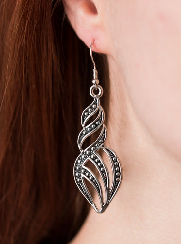 Dotted in glistening studs, antiqued silver ribbons swirl and swoop into a flame-like lure. Earring attaches to a standard fishhook fitting.  Sold as one pair of earrings.